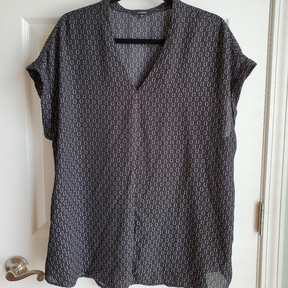 Pleione black and white top
